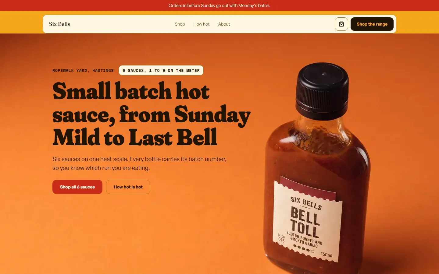 Six Bells Hot Sauce homepage: a photographed sauce bottle on a hot orange ground beside the headline